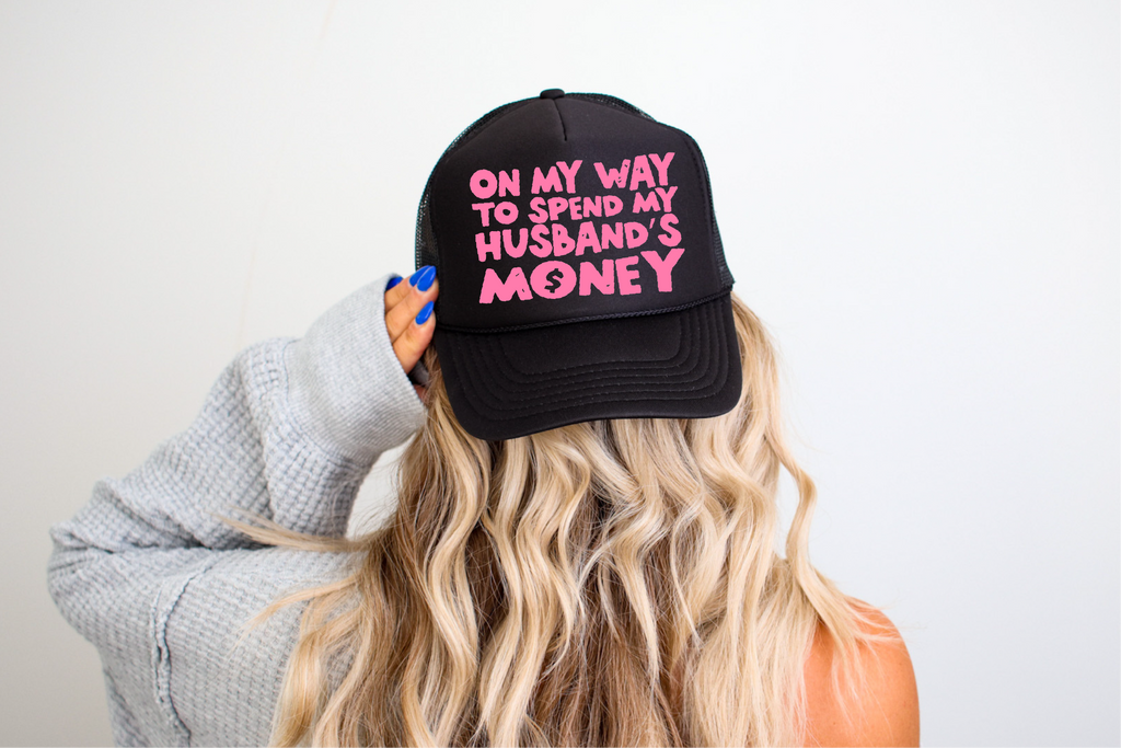 On My Way To Spend My Husbands Money Foam Black Trucker Hat