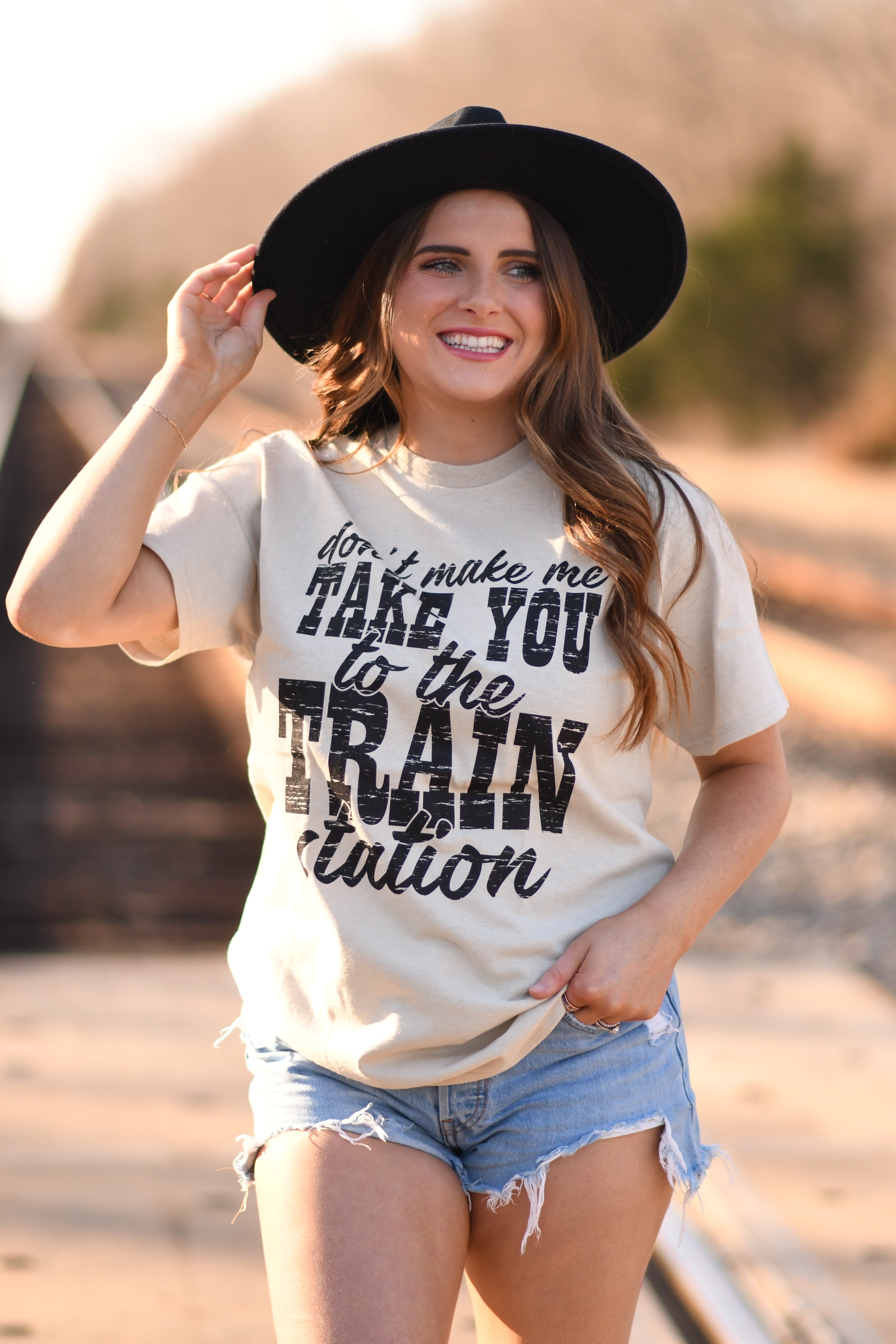 Don’t Make Me Take You To The Train Station Tee (Delta)